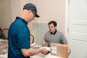 Gavin McCloskey greeting participant