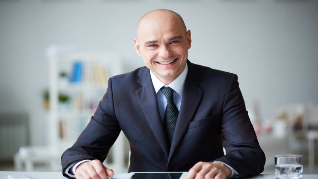 Man sitting at desk.