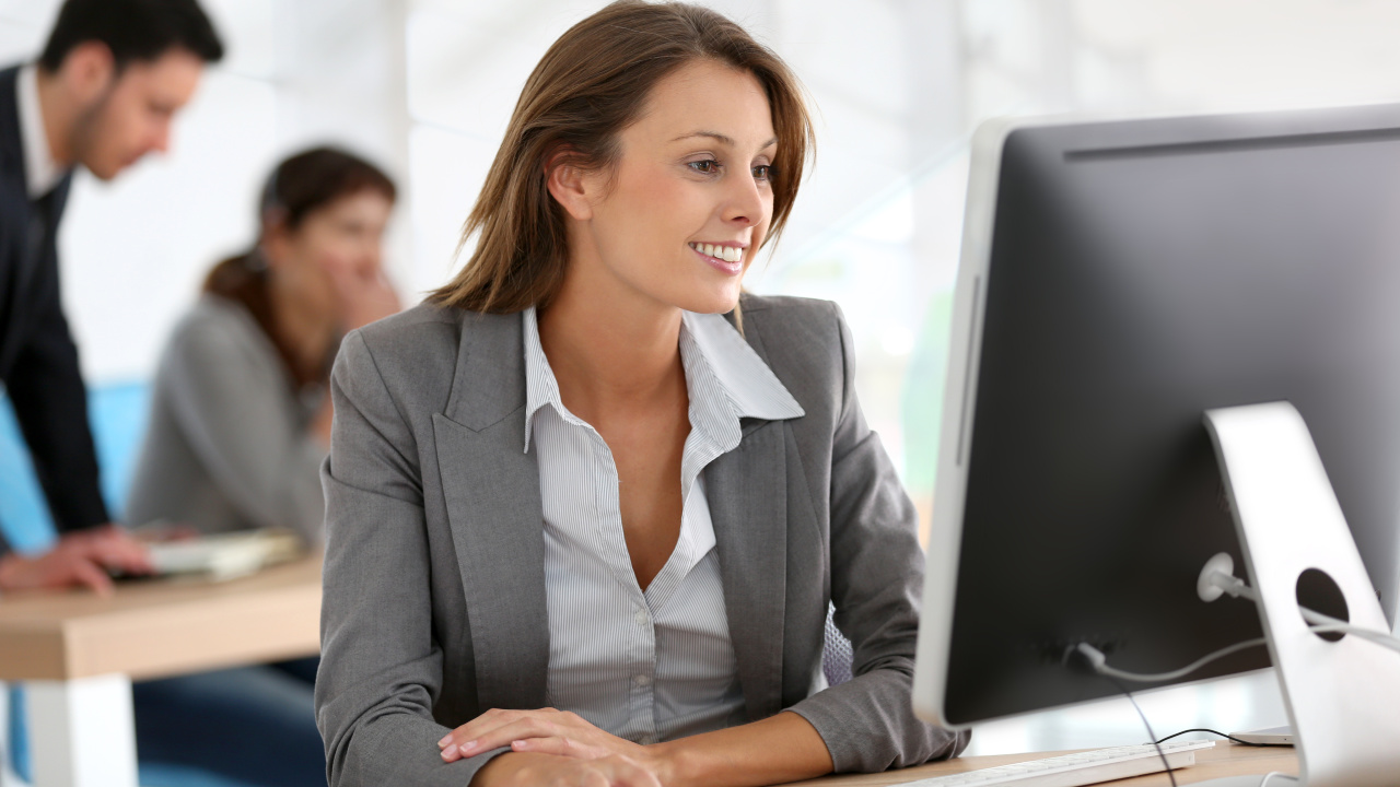 Woman at computer.