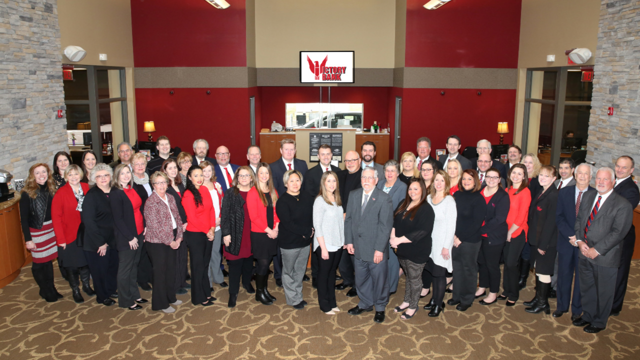 The Victory Bank staff group photo. (2019)