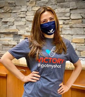 Rose Hoffman wearing the #igotmyshot t-shirt and mask.